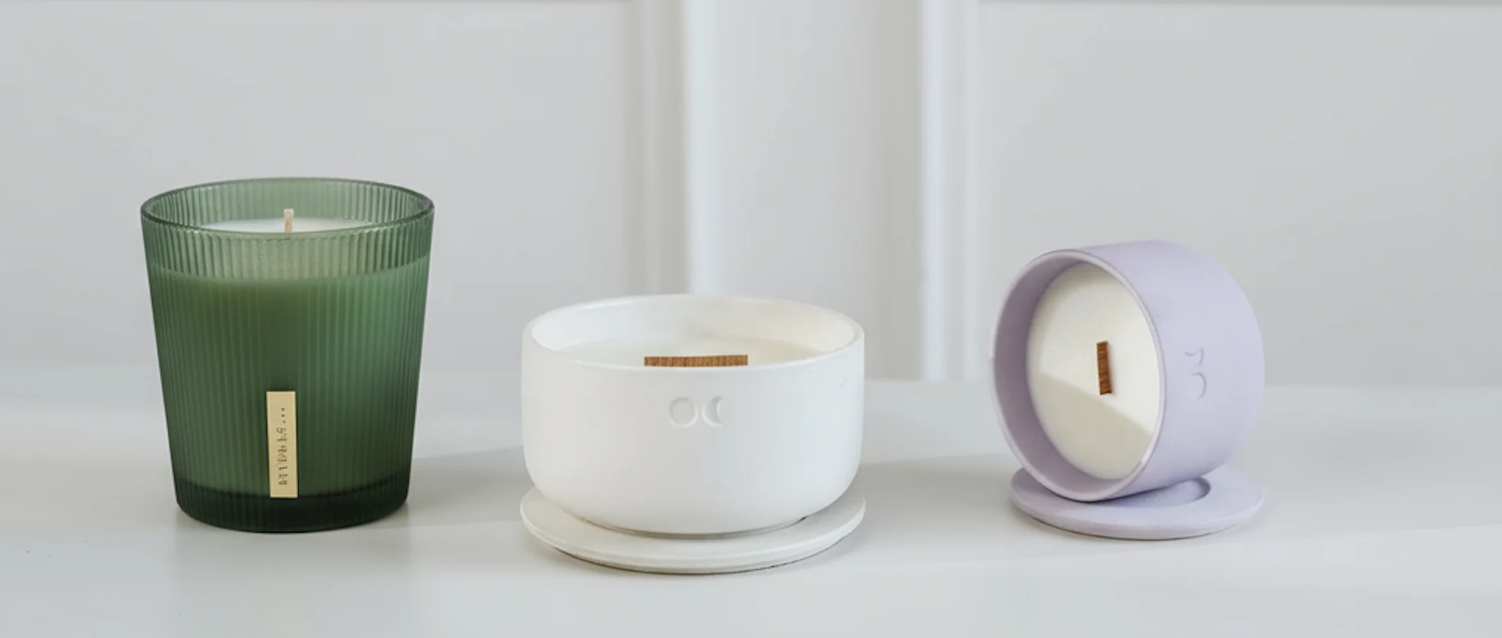 Combine these two candles images to one. Take rituals candle, and place it near Lumond candle. Do not change the candles, they should be the same as they are.